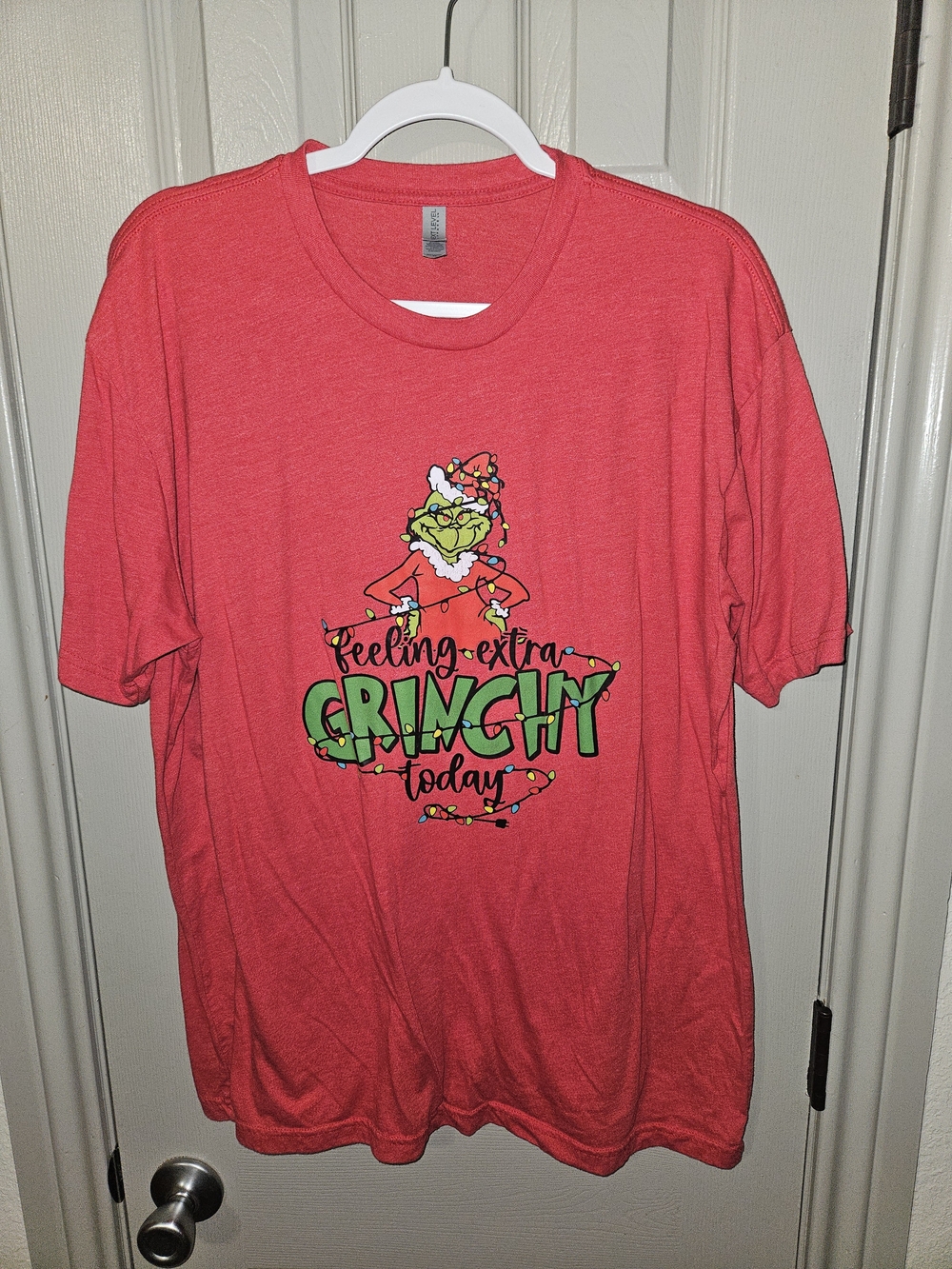 Women's Next Level Apparel Red Grinch Graphic Tee